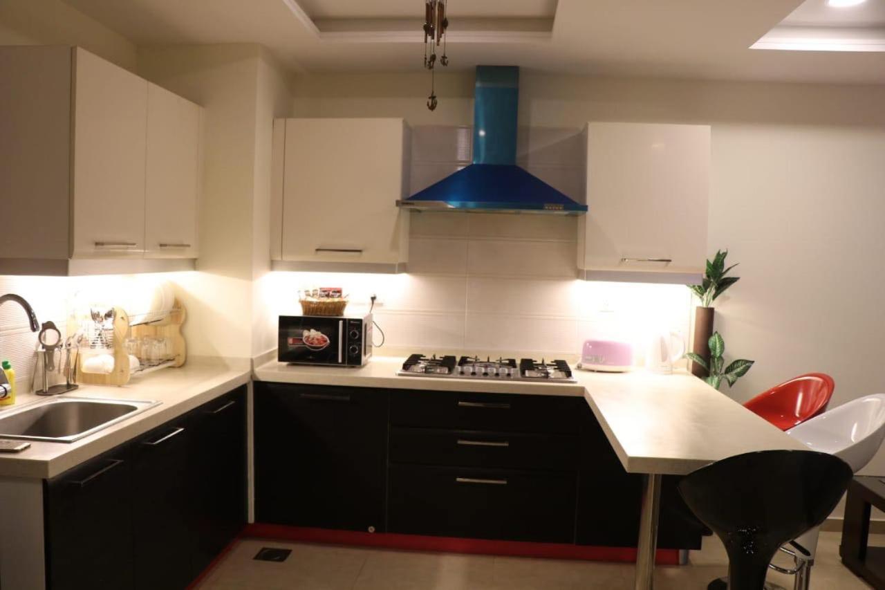 רוואלפינדי Elegant & Charming One Bed Apartment In Bahria Town מראה חיצוני תמונה